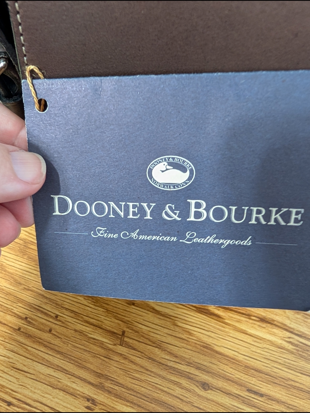 Dooney & Bourke Brown and Black Pebbled Leather Crossbody - Picture 2 of 14